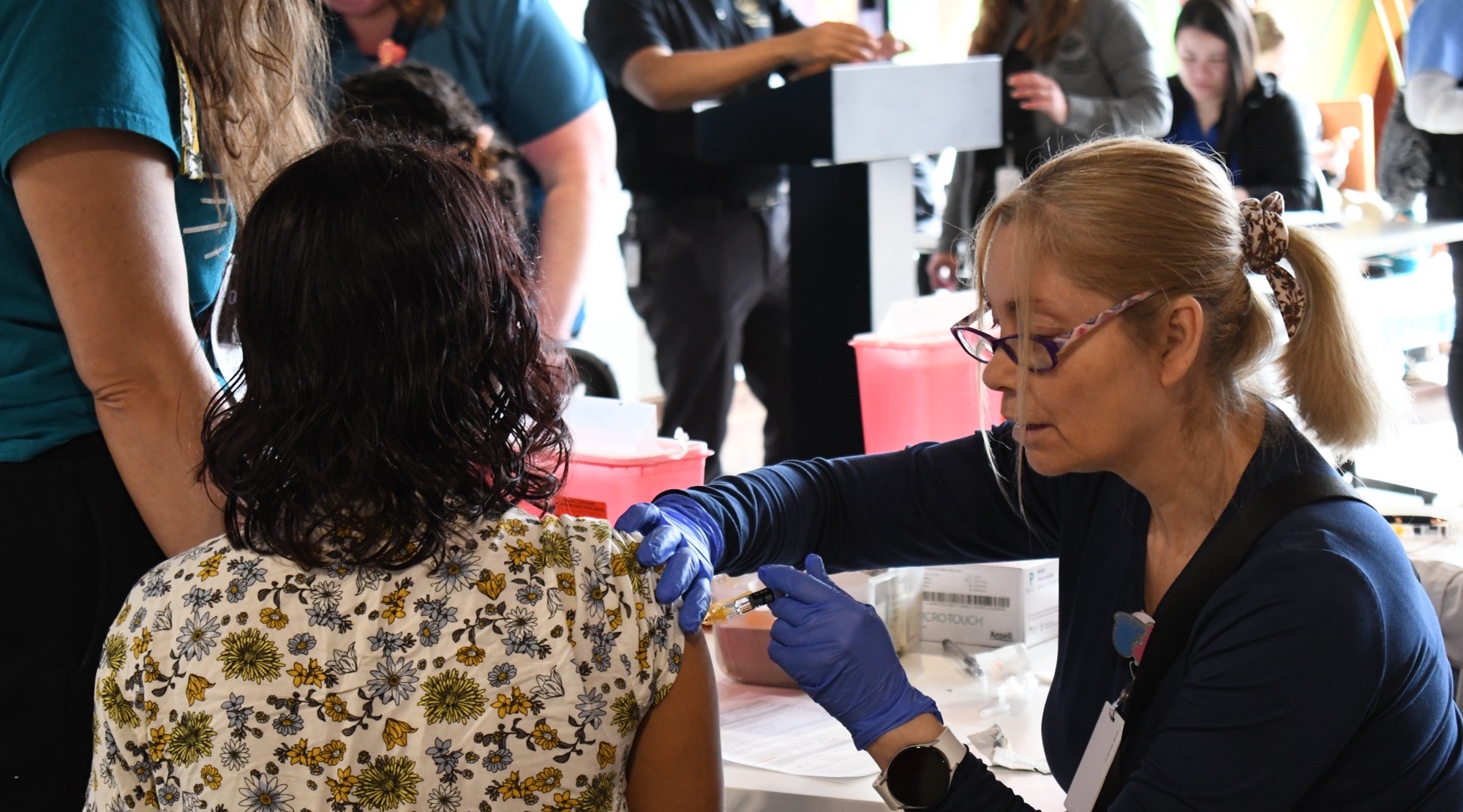 Nurse giving a vaccine